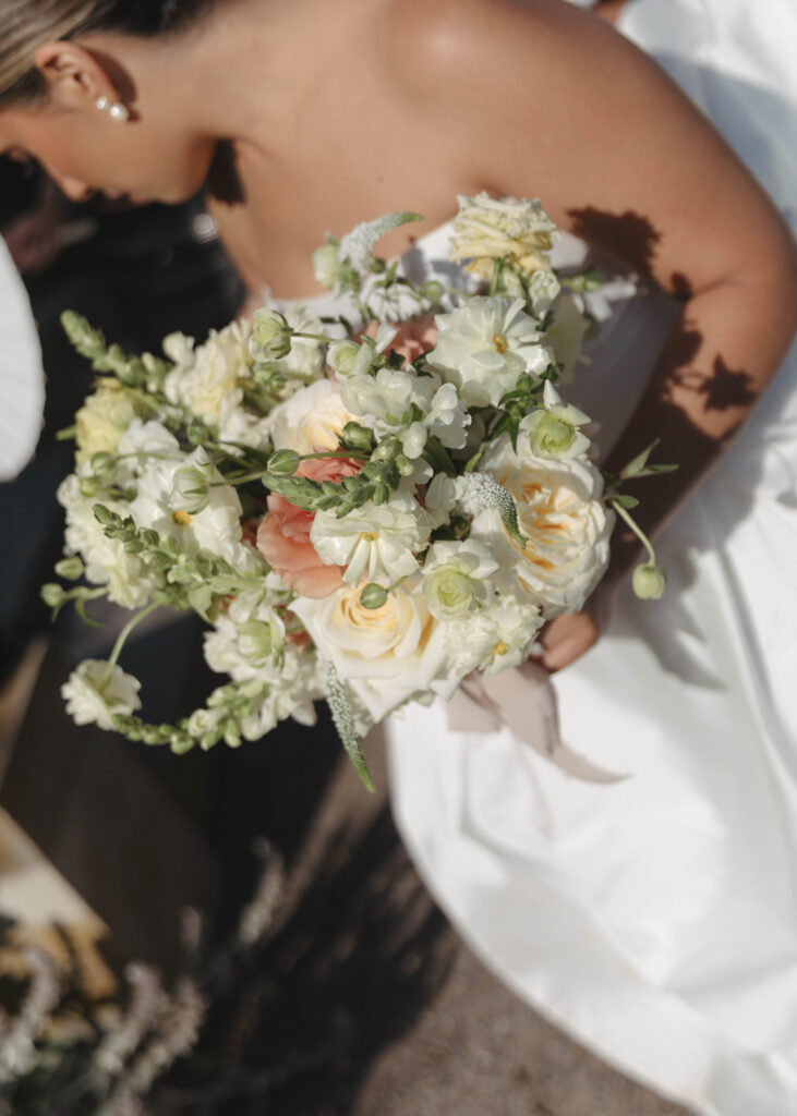 Documentary and editorial wedding photography from garden summer outdoor wedding at Eolia Mansion in Connecticut. Photos taken by Suz Lundeen Photo - destination wedding, family, and maternity photographer based in New England and the Midwest. Photo of bridal bouquet from Fresh Flower Bar in Fairfield, CT.